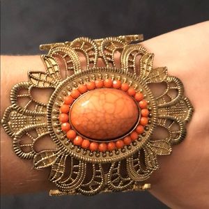 Ornate gold and coral bracelet